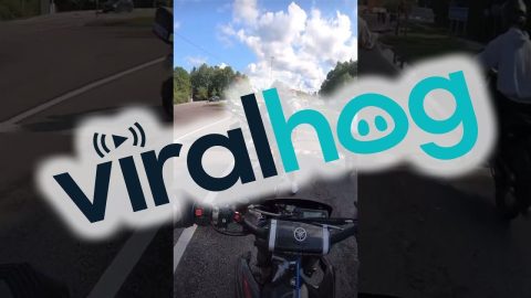 Cop Clipped By Fellow Motorist || ViralHog