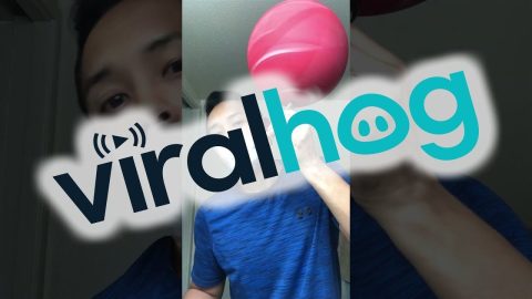 Man Shaves While Balancing Basketball on Razor || ViralHog