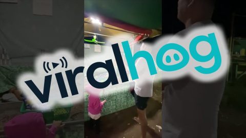 Missed Throw Reveals Someone Sleeping Under Carnival Game || ViralHog