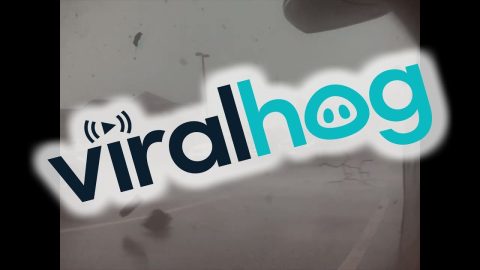 Tesla Cam Captures Tornado Tearing Up Parking Lot || ViralHog
