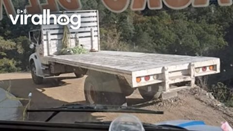 Truck Expertly Navigates Cliff's Edge || ViralHog