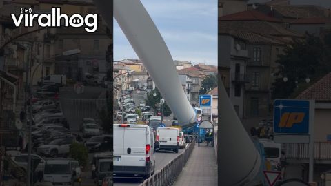 Maneuvering a Massive Wind Turbine Blade Through Town || ViralHog
