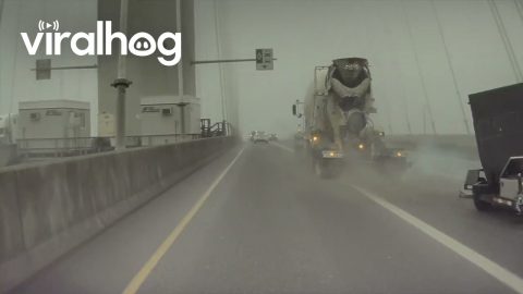 Man Has Extremely Close Call With a Cement Truck