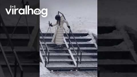 Woman Descends Stairs in Skis || ViralHog