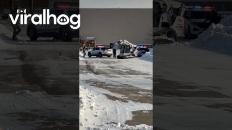Skid Loader Plows Into Police Cruiser || ViralHog