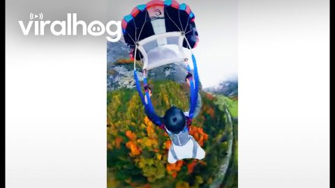 Snowy BASE Jump in Switzerland || ViralHog