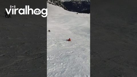 Snowboarder Catches an Edge and Tumbles Down Steep Slope || ViralHog