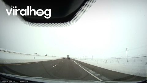Passing Car Hits Ice and Rolls Into Ditch || ViralHog
