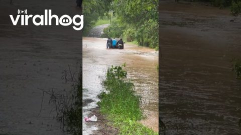 Men Push Car Through Flooded Street || ViralHog