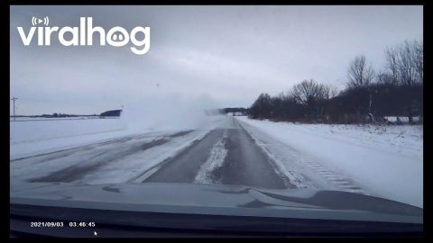 Dashcam Captures Car Fishtailing Into a Snowy Ditch || ViralHog