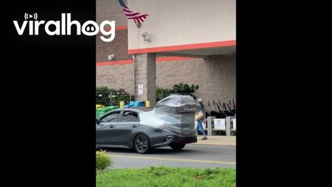 Shopper Uses Plastic Wrap to Transport a BBQ Grill || ViralHog