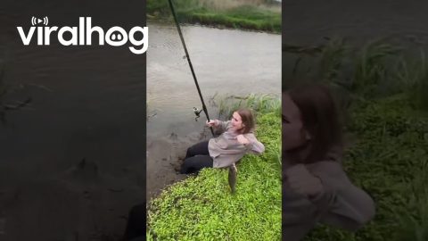 Fisher Gets Muddy But Saves Catch || ViralHog