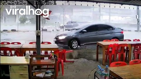 Falling Sign Nearly Crushes Sedan || ViralHog
