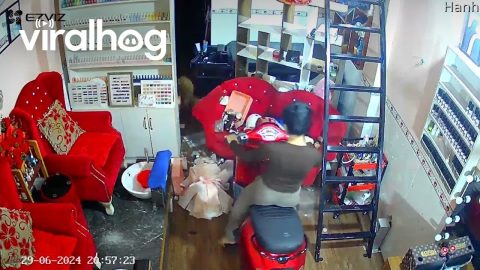 Woman Crashes Her Motorbike Inside || ViralHog