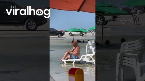 Man Shaves Legs On Beach || ViralHog