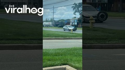 Wheel on the Loose Crashes Into Car || ViralHog