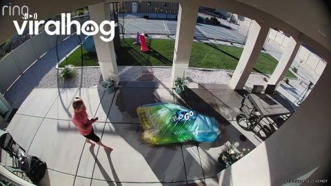 Woman Tries to Move a Splash Pad and Ends Up Flying Backwards || ViralHog