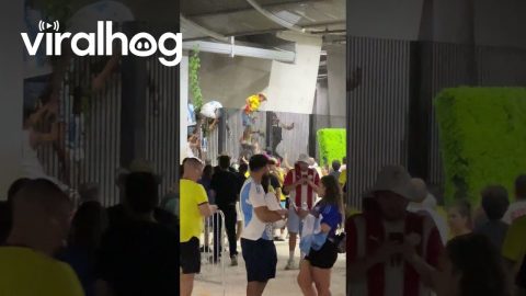 Soccer Fans Climb Over Fence at Stadium || ViralHog
