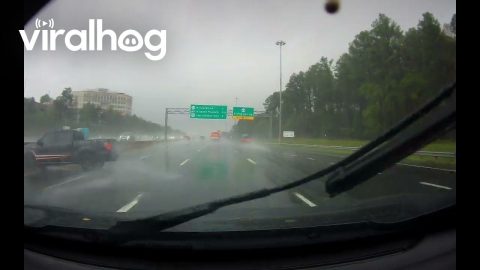 Truck Spins Out on Rainy Freeway || ViralHog
