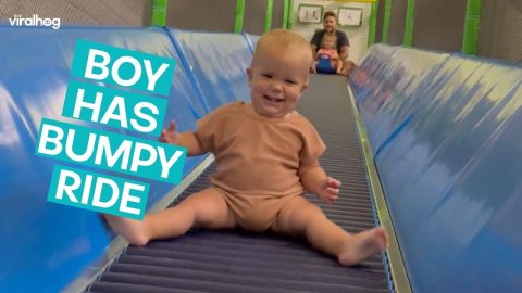 Boy Takes Bumpy Ride Down Slide || ViralHog