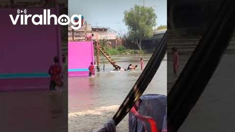 Woman Slips and Falls Down Stairs at Water Park || ViralHog