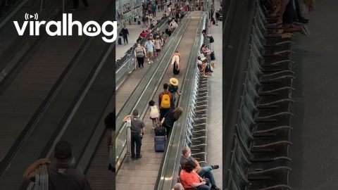 Travelers Have Fun on Moving Walkway at Denver Airport || ViralHog
