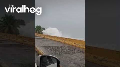Crashing Waves Soak Vehicle || ViralHog