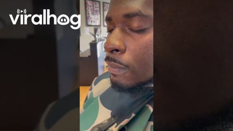 Barber Pranks Client By Softly Brushing Lips || ViralHog