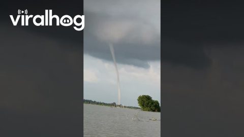 Tall Waterspout Descends Into River Water || ViralHog