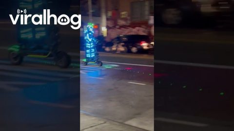 Glowing Guy Scooters By || ViralHog