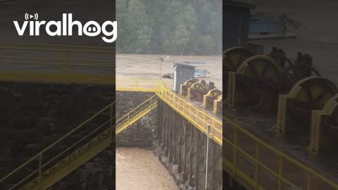 Pontoon Boat Goes Over Flooded Dam in Virginia || ViralHog