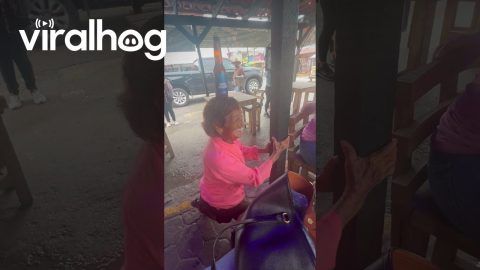 Woman Dances While Balancing a Bottle on Her Head || ViralHog