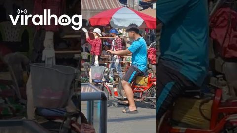 Street Merchant Brings "Backup Dancers" || ViralHog