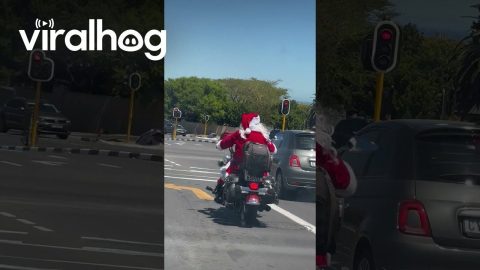 Santa Rides a Motorcycle Through Cape Town || ViralHog