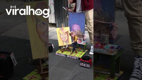 Street Artist Paints With Marionette Puppet || ViralHog