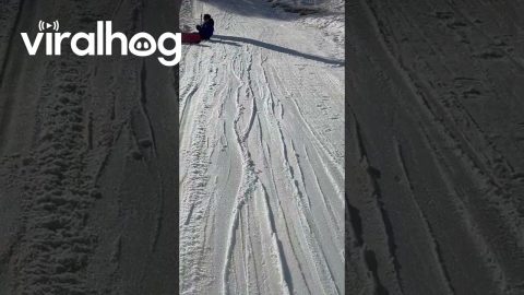 Snowboarder On Tow Lift Fails To Mind Pole || ViralHog