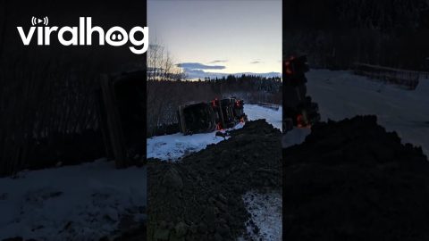 Truck Tips Over While Backing Up In Snow || ViralHog