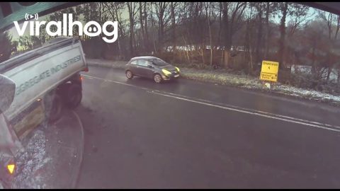 Extremely Near Miss as Truck Slips Off Road || ViralHog