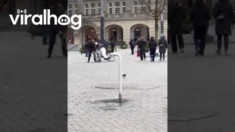 Cyclist Falls In Amsterdam Plaza || ViralHog