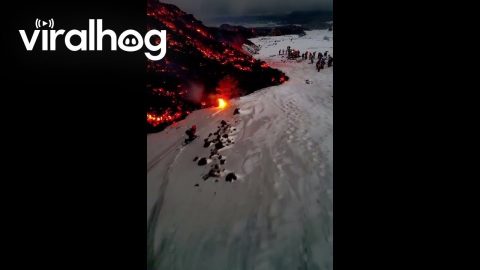Snowboarding Next to Flowing Lava || ViralHog