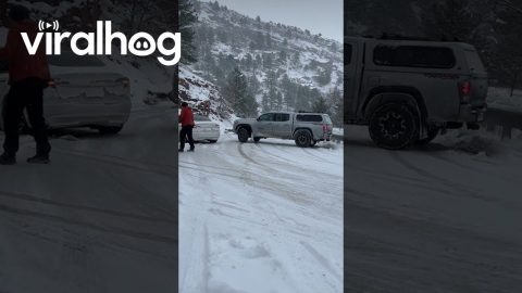 Icy Road Sends Cars Skidding on Windy Mountain Pass || ViralHog