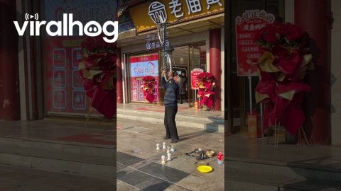 Man Balances Bike On His Chin || ViralHog