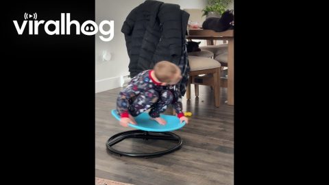 Child Whirls Around On Spin Chair || ViralHog