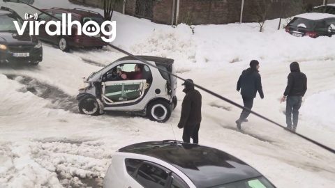 People Help Push A Mini Car Out Of The Snow || ViralHog