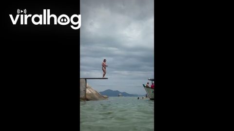 Woman Belly Flops While Swimming In Brazil || ViralHog