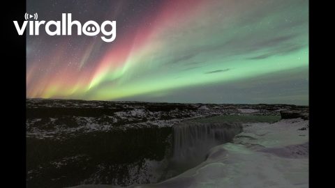 Auroras Dance Over Iceland’s Most Powerful Waterfall || ViralHog