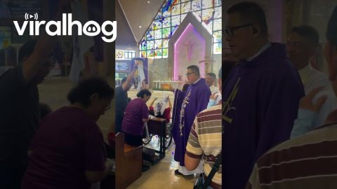 Priest Uses Water Pump to Give Final Blessing || ViralHog