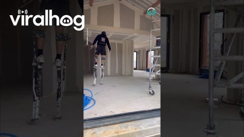 Worker on Stilts Picks Up Dropped Tools in Style || ViralHog