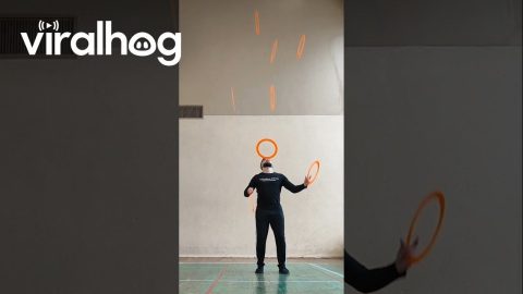 Man Juggles 7 Rings While Balancing One on His Head || ViralHog