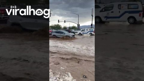 Ambulance Navigates Flooded Streets in Fort Mohave, Arizona || ViralHog